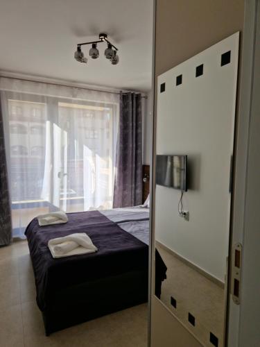 Postel nebo postele na pokoji v ubytování Polarstar 205A am Meer Sveti Vlas