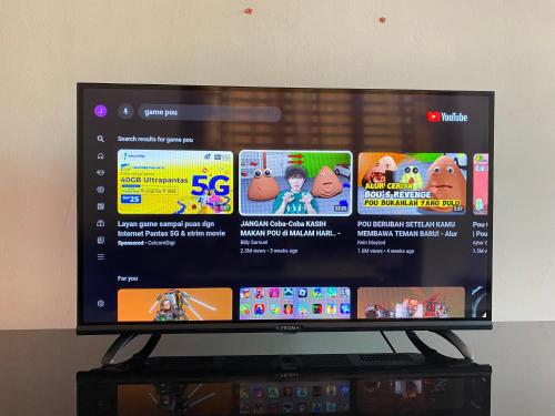 TV a/nebo společenská místnost v ubytování No 115 Homestay Tasik Raban Lenggong