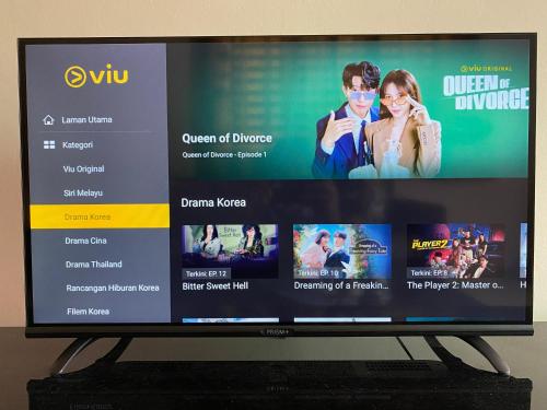 TV a/nebo společenská místnost v ubytování No 115 Homestay Tasik Raban Lenggong