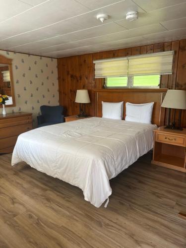 Postel nebo postele na pokoji v ubytování Starlight Inn