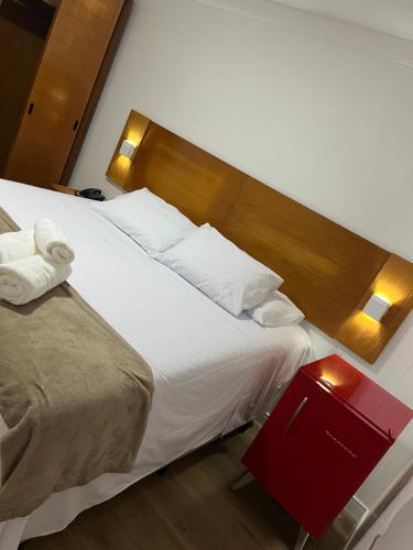 Postel nebo postele na pokoji v ubytování Suíte confortável beira mar