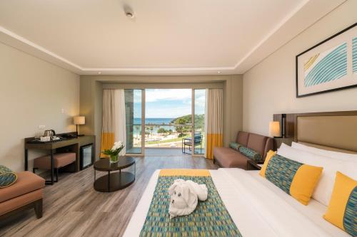 Postel nebo postele na pokoji v ubytování Belmont Hotel Boracay