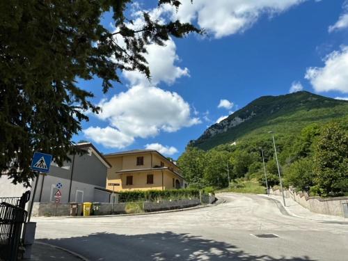 an empty road with a mountain in the background at Apartment in Esanatoglia near Apennines Trails in Esanatoglia