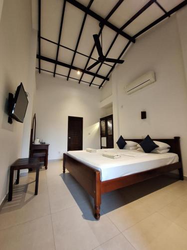 Katil atau katil-katil dalam bilik di Villa Goodwill Paradise