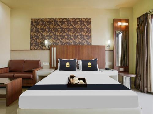 Postel nebo postele na pokoji v ubytování Hotel Tela Suite Near IGI Airport Delhi