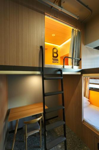 Litera o literas de una habitación en Wohkoon者行孙青年酒店北京南站草桥店