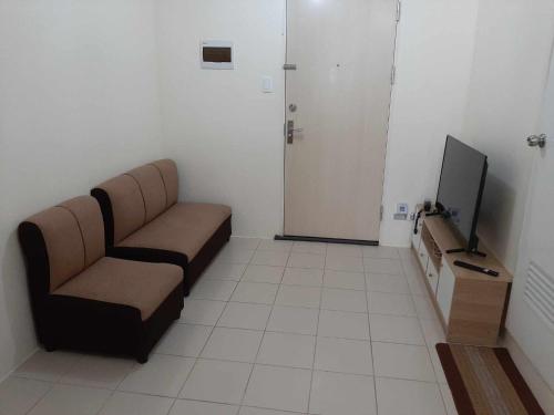 TV/Unterhaltungsangebot in der Unterkunft Condo in Pasig