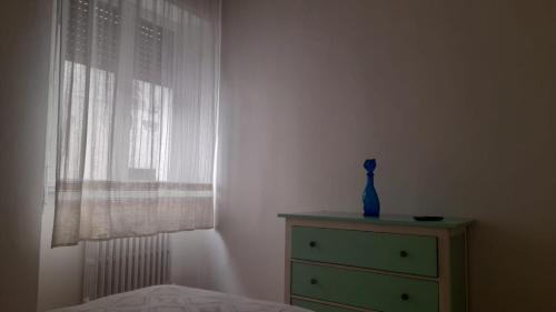 Una cama o camas en una habitación de Casa Liburnia