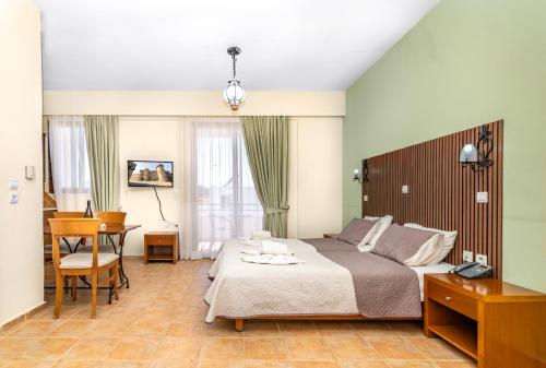 Postel nebo postele na pokoji v ubytování Villas Duc - Rhodes