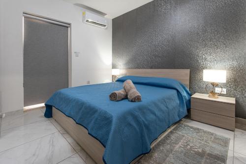 Katil atau katil-katil dalam bilik di Wonderful Sunny Apartment