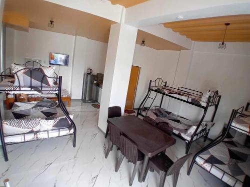 Ένα ή περισσότερα κρεβάτια σε δωμάτιο στο Studio hall unit 1