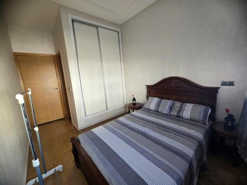Postel nebo postele na pokoji v ubytování residence Perla Al Mansouria