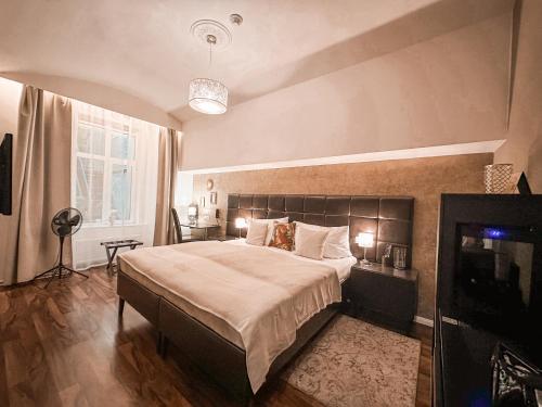 Alfons Boutique Hotelにあるベッド