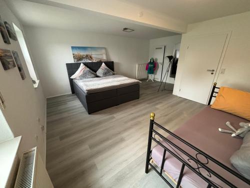 a bedroom with a bed in a room at Finca Bornrows Nähe Bad Oeynhausen in Vlotho