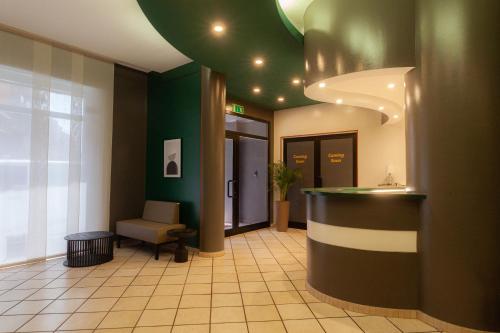 Kuchyň nebo kuchyňský kout v ubytování RRRapido Hotel