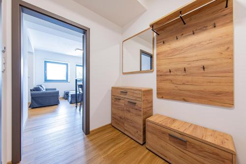 a room with a sliding barn door in a house at Rezidence Novosadská in Olomouc