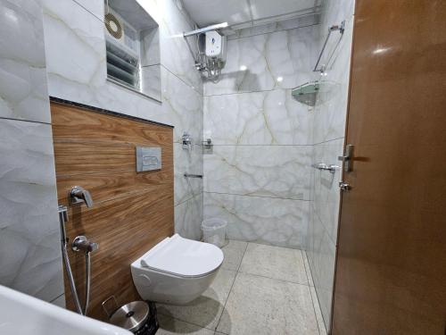 Un baño de Olive Residence, Near Lakeshore Hospital