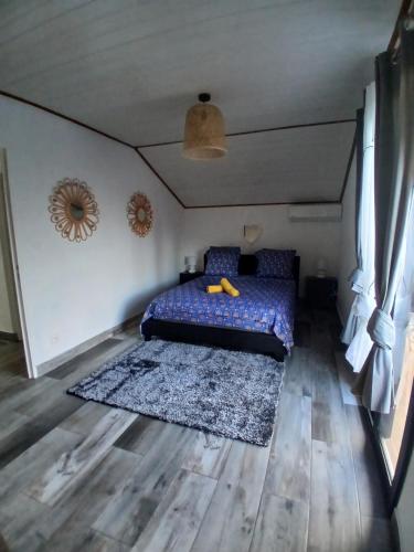 Postel nebo postele na pokoji v ubytování Chez Reine et Yves