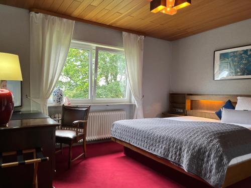 Postel nebo postele na pokoji v ubytování Hotel-Restaurant Berghof