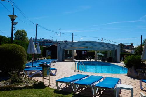 Bazén v ubytování Hotel Canelas nebo v jeho okolí
