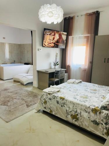 Postel nebo postele na pokoji v ubytování Guest House La Corte