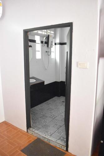 a bathroom with a toilet and a mirror at Blanco Hideout Railay - Youth Hostel 18 to 35 Only in Railay Beach