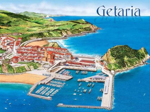 a map of gstaad with boats in a harbor at Harritarte Getaria in Getaria