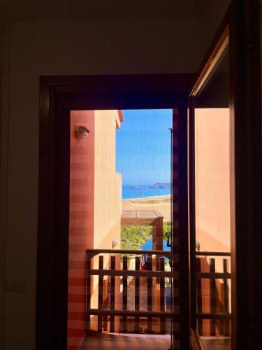 a view from a door looking out at a balcony at -Torre dei Corsari- TERRAZZA SUL MARE in Torre Dei Corsari