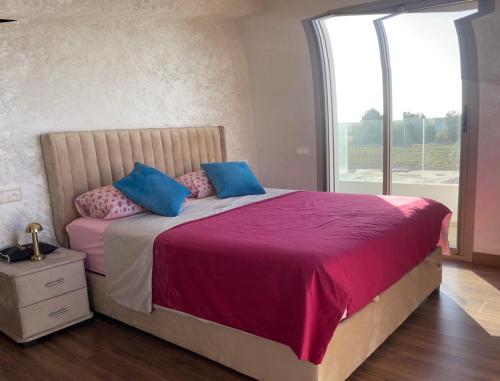 Postel nebo postele na pokoji v ubytování Villa paradis