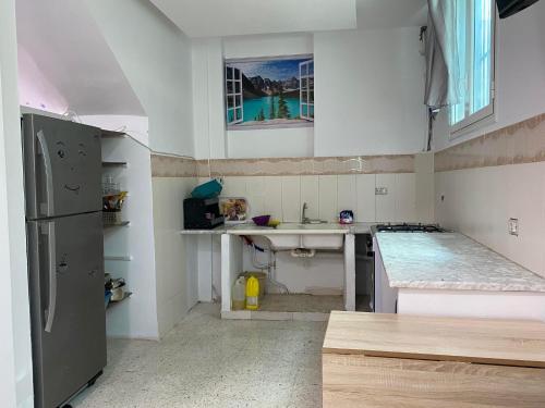 Η κουζίνα ή μικρή κουζίνα στο Appartement S1 pieds dans l'eau