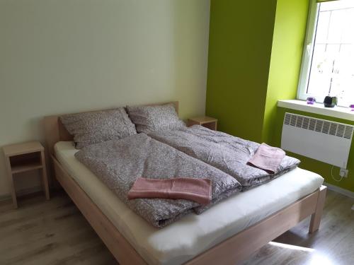 Postel nebo postele na pokoji v ubytování Apartament Kamienica