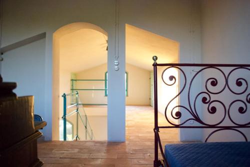 Posteľ alebo postele v izbe v ubytovaní Agriturismo La Malcontenta e il Lupo