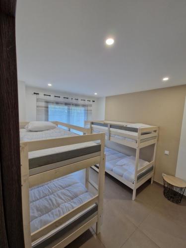 Postel nebo postele na pokoji v ubytování Villa ALVALMAX