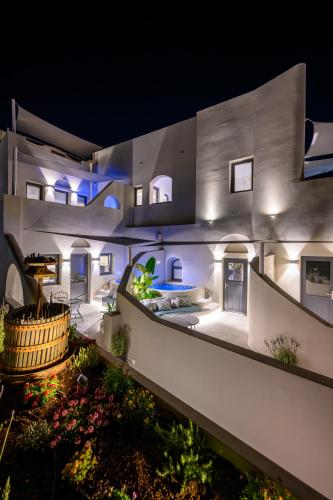 an aerial view of a house at night at Galaria Serenity Suites in Vóthon