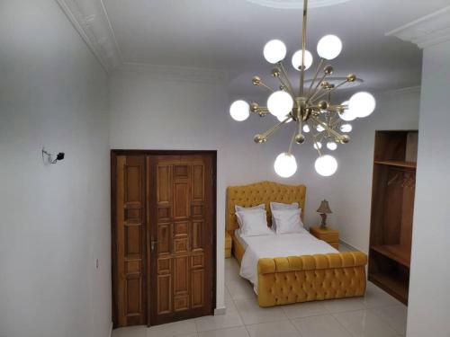 Résidence Emeraude Librevilleにあるベッド