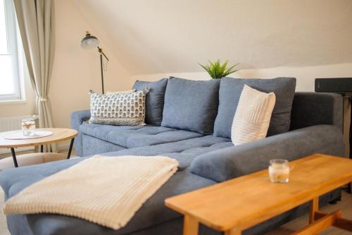 Ruang duduk di Ferienwohnung Schlafgemach - Gemütlicher Urlaub zwischen Ostsee und Holsteinische Schweiz - Boxspringbett & Wallbox