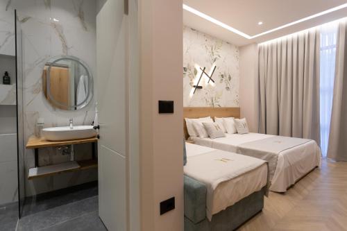 Postel nebo postele na pokoji v ubytování Nayel Hotel