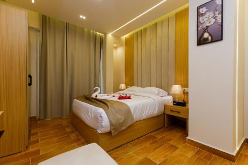 Postel nebo postele na pokoji v ubytování Rizk Pyramids View Hotel
