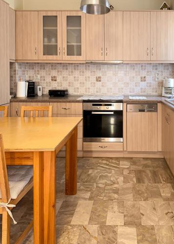 Dapur atau dapur kecil di Billmar Apartment