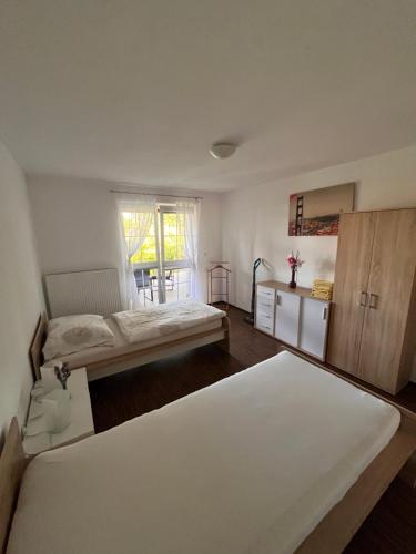 Postel nebo postele na pokoji v ubytování Apartmán Sadová 430