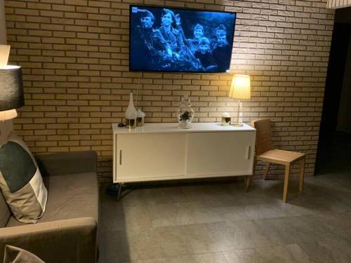 TV a/nebo společenská místnost v ubytování splendido appartamento