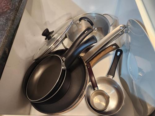 a bunch of utensils sitting in a drawer at Ocean Pearl in Peyia