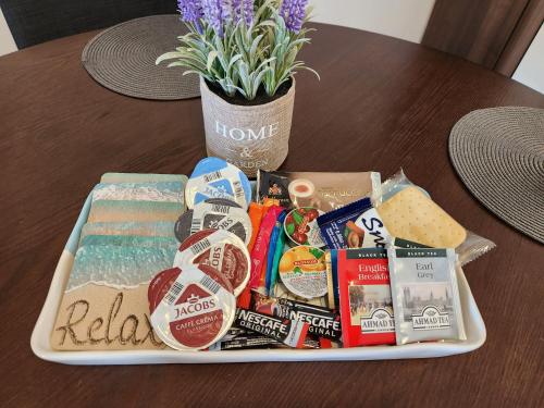 a tray of snacks and chips on a table at Ocean Pearl in Peyia