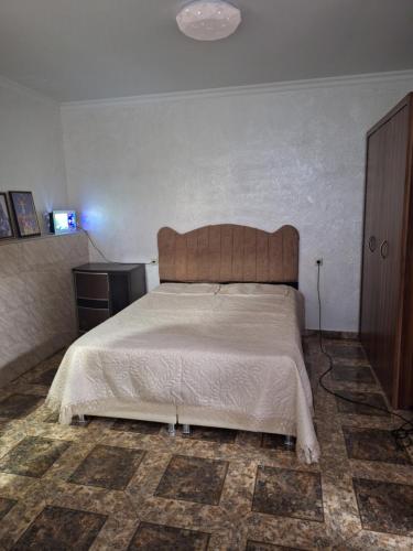 Postel nebo postele na pokoji v ubytování Beqa Hous
