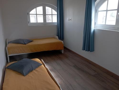 Chambre 2 lits Simples Spa Piscine à la PlagePlage