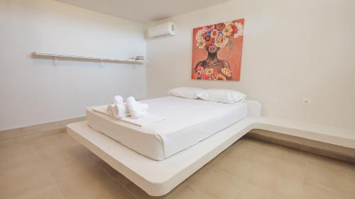 Katil atau katil-katil dalam bilik di Beach Front Villa Toroni