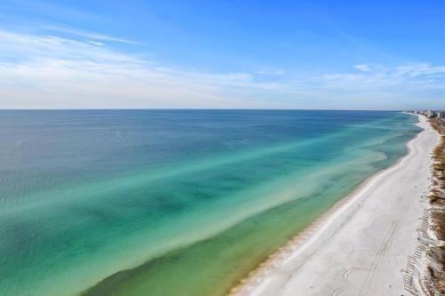an aerial view of the ocean and a beach at Yellow Pearl Pool heat GolfCart deals Steps2Beach in Destin