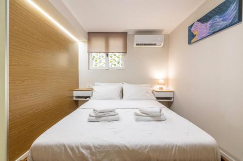 A bed or beds in a room at Stef&Art Old Town House