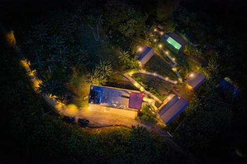 an overhead view of a house at night with lights at Majentra Ella in Ella
