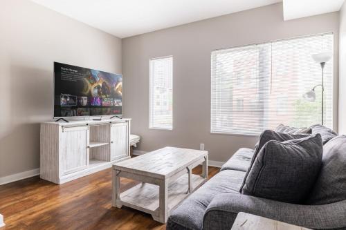 a living room with a couch and a table at Luxury Downtown Townhome Unit 5 in Cleveland